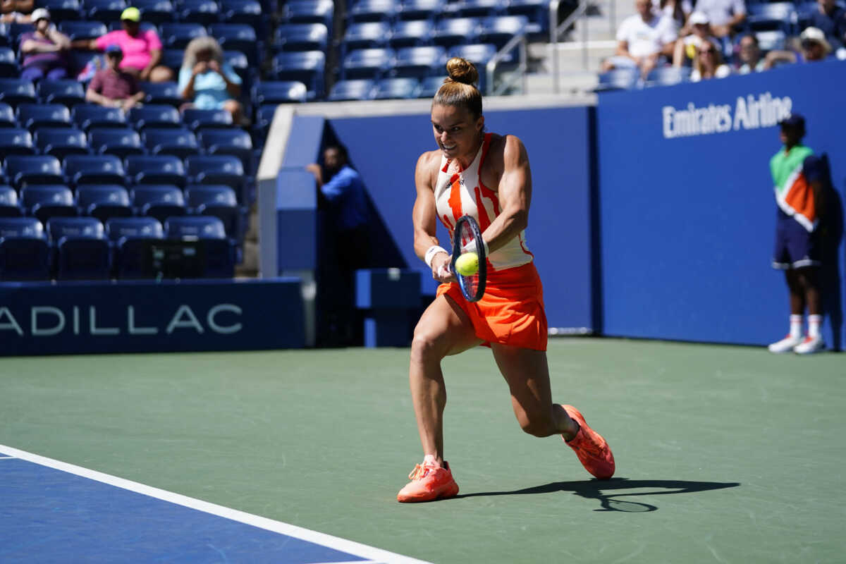 Aug 31, 2022; Flushing, NY, USA; Maria Sakkari of Greece hits to Xiyu Wang of China on day three of the 2022 U.S. Open tennis tournament at USTA Billie Jean King Tennis Center. Mandatory Credit: Danielle Parhizkaran-USA TODAY Sports