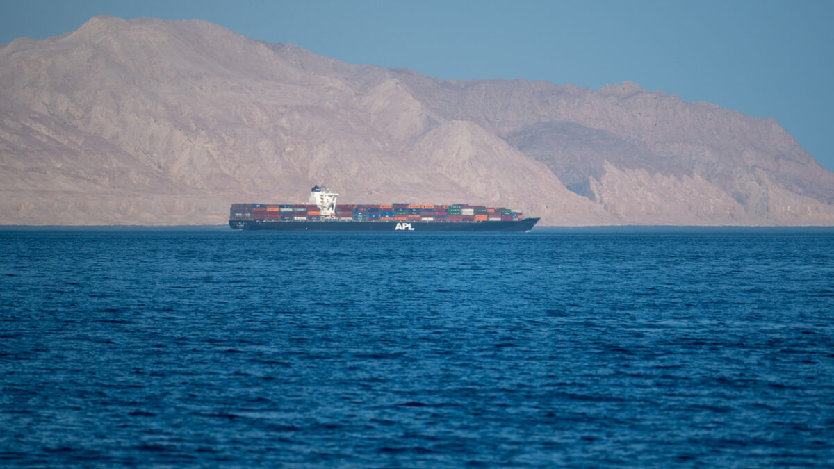 Iranian coastline near the Strait of Hormuz. giant sea container ship in the strait of Hormuz. Near East